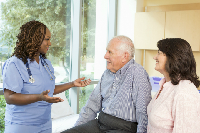 Nurse speaking with patient