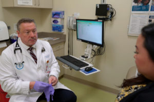 Leonid Pravoverov with patient