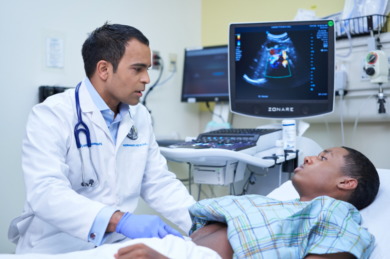 Doctor with patient in hospital