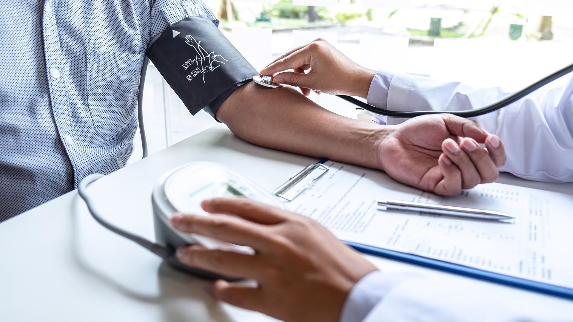 Patient having blood pressure taken