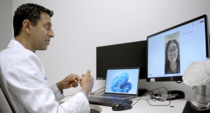 Nikhil Mulchandani, a Permanente physician, checks in on a patient online.