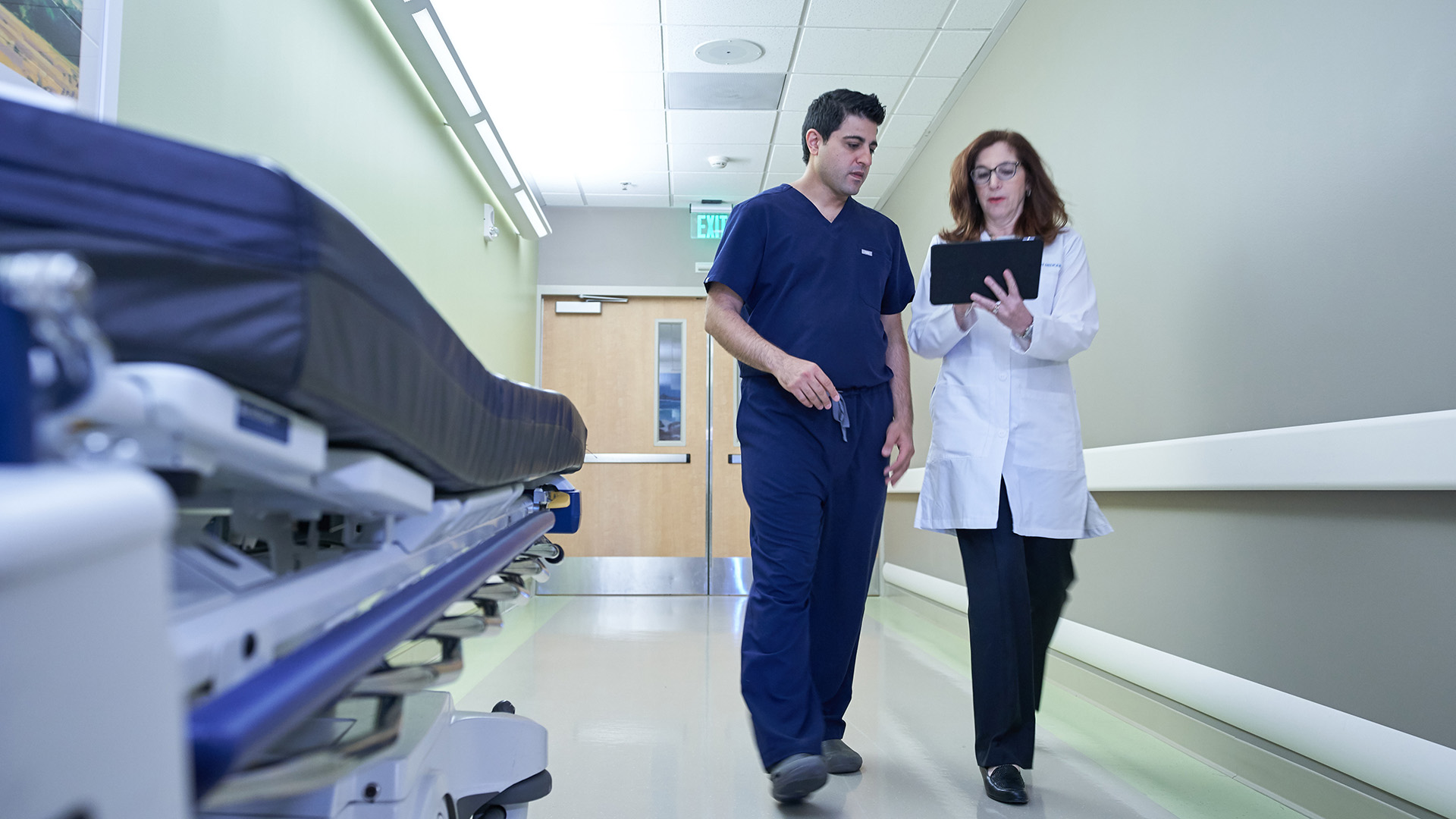 physicians walking in hallway